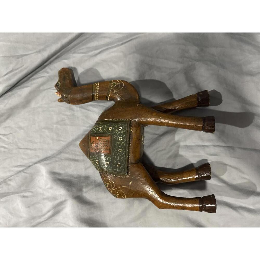 Handcrafted Wooden Camel Figurine with Decorative Saddle